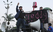 University students stage a protest against government policies, demanding lower fuel pric...