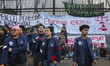 University students stage a protest against government policies, demanding lower fuel pric...