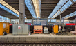 A Deutsche Bahn information sign reading ''Where can I get help at my station?'' stands be...