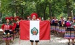 Members of the Peruvian, Bolivian, and Ecuadorian communities in Spain, accompanied by rep...