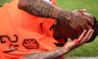 Crysencio Summerville of the Netherlands is seen with a head injury during the FIFA World...
