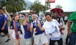 Fans of the Japan national team attend the Monterrey Stadium to support their team during...
