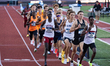 Collegiate track and field teams from across the United States compete in the men's 5,000m...