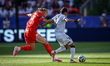 Ibrahim Bayesh of Iraq battles for possession with Erling Haaland of Norway during the FIF...