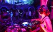 A DJ performs during a silent disco dance party at the courtyard of the Jagiellonian Unive...