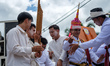 Performers take part in the annual Phi Ta Khon Festival parade in Dan Sai district, Loei p...