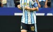 Lionel Messi of Argentina scores his team's first goal during the FIFA World Cup Group J m...