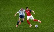 Alexis Mac Allister of Argentina and Paul Wanner of Austria compete during the 2026 World...
