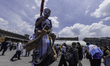 Argentine supporters and fans of various nationalities watch the 2026 FIFA World Cup match...
