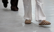 A model presents a creation from the GARCIAS Spring/Summer 2027 collection titled ''Si lo...