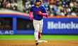 New York Mets player Francisco Alvarez #4 rounds the bases after hitting a solo home run d...