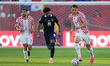 Carlos Harvey #14 of Panama and Ante Budimir #11 of Croatia compete for the ball during th...