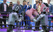 Foreign audiences watch a Unitree humanoid robot boxing match at the 4th China Internation...