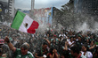 Supporters of the Mexico national soccer team watch the 2026 FIFA World Cup match between...