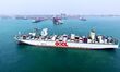 A cargo ship loaded with foreign trade containers enters the port of Qingdao, Shandong Pro...