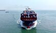 A cargo ship loaded with foreign trade containers enters the port of Qingdao, Shandong Pro...