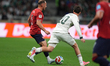 Vladimir Coufal #5 of the Czechia national team is pressured by Mateo Chavez #20 of the Me...