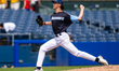 Zach Johnston of the Trenton Thunder delivers a pitch during an MLB Draft League baseball...