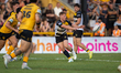 Tom Inman makes a pass during the BetFred Super League match between Castleford Tigers and...