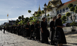 Thai mourners walk in line to pay their respects to the body of the late Thai Princess Baj...