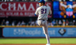 Jonah Tong of the Syracuse Mets delivers a pitch during a MiLB baseball game at Coca-Cola...