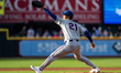 Jonah Tong of the Syracuse Mets delivers a pitch during a MiLB baseball game at Coca-Cola...