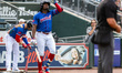 Felix Reyes of the Lehigh Valley Iron Pigs heads to the plate during a Minor League Baseba...