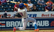 Cristian Pache of the Syracuse Mets hits the ball during a Minor League Baseball game at C...