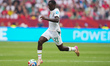 Habib Diarra #21 of Senegal drives the ball forward during the 2026 FIFA World Cup Group I...
