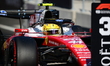 Lewis Hamilton of Scuderia Ferrari celebrates his third place during qualifying for the Au...