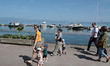 Tourist enjoya walk in Evian, a famous town in Eastern France by the Geneva Lake in Alps a...