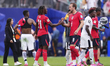 Harry Kane of England shakes hands with Eberechi Eze of England during the FIFA World Cup...