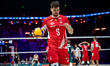 Mikolaj Sawicki competes during the Men's VNL FIVB Volleyball Nations League match between...