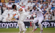 Daryl Mitchell of New Zealand is struck on the forearm by a bouncer from England captain B...
