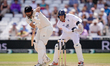 England wicketkeeper Jamie Smith stands up to the stumps off the bowling of England captai...