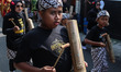 Children play music as part of a cultural parade to celebrate the anniversary of Polowijen...
