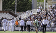Daryl Mitchell of New Zealand heads for the dressing room as players leave the pitch after...
