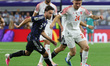 Nicolas Tagliafico of Argentina and Ali Azaizeh of Jordan compete during the Group J FIFA...