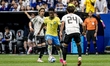 Junya Ito of Japan and Vinicius Junior of Brazil during the 2026 World Cup match between B...