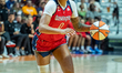Shakira Austin #0 of the Washington Mystics handles the ball during the WNBA game between...