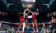 Kiki Iriafen #44 and Shakira Austin #0 of the Washington Mystics defend a shot by Olivia N...