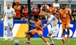 Christ Inao Oulai of Ivory Coast and Martin Odegaard of Norway during the 2026 World Cup m...