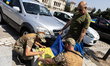 All-terrain vehicles purchased with funds raised by Russians living in Bulgaria are handed...