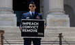 In an act of civil disobedience, active duty U.S. Air Force Major Jason Watson calls for t...