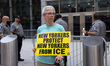 Members of Rise and Resist and their supporters hold a weekly pro-immigration vigil outsid...
