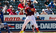 Dylan Moore of the Lehigh Valley Iron Pigs takes a pitch during a Minor League Baseball ga...