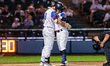 Kevin Verde of the Somerset Patriots celebrates a home run with Connor McGinnis of the Som...