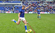 Ewan Irwin of Warrington Wolves participates in the pre-game warm-up during the Betfred Su...