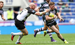 Zac Woolford avoids Jordan Thompson during the BetFred Super League match between Huddersf...
