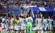 Lionel Messi of Argentina is thrown into the air by teammates during the FIFA World Cup 20...